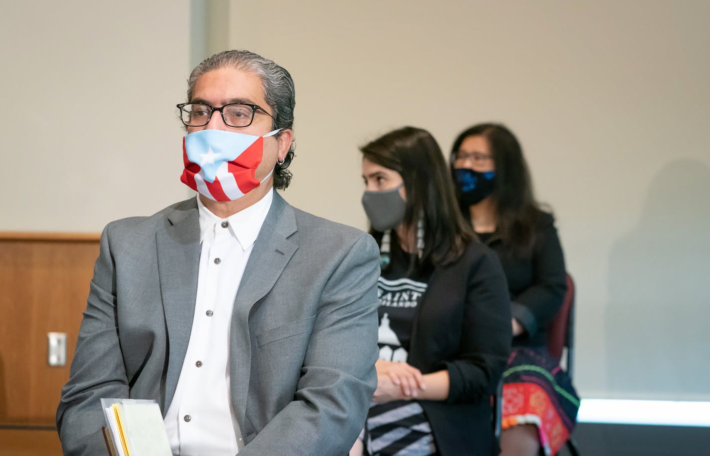 Rep. Carlos Mariani, DFL-St. Paul was a key author of the bill. Behind him are Lt. Governor Peggy Flanagan and Rep. Kaohly Her, DFL-St. Paul. Gov. Tim Walz signed into law a sweeping package of police accountability measures Thursday, making Minnesota the latest state to adopt changes to law enforcement in the wake of George Floyd's death. ] GLEN STUBBE • glen.stubbe@startribune.com Thursday, July 23, 2020 Gov. Tim Walz signed into law a sweeping package of police accountability measures Thursda