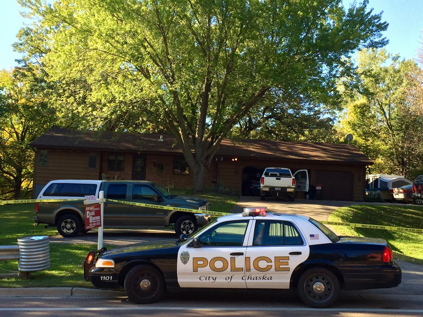 Police investigate the scene of a double shooting Thursday night night in Chaska.