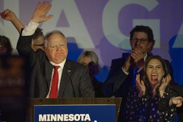 Gov. Tim Walz, left, and Lt. Gov. Peggy Flanagan celebrated winning their second term at the Intercontinental Hotel in St. Paul Tuesday night.
