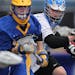 Chris Thomas(3) finds himself chased by Robert Veitch(40) of the Tartans.[At Minnetonka H.S. in a quarter final lacrosse game between Wayzata and the 