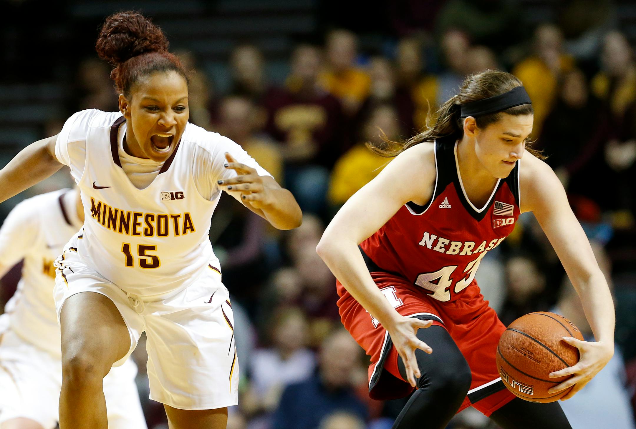 The Gophers' Allina Starr and Nebraska's Rachel Blackburn (43) fought for a loose ball in the third quarter Thursday.