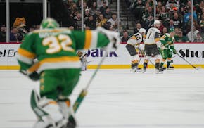 Wild goaltender Filip Gustavsson (32) skates to the bench after coach John Hynes pulled him during overtime.