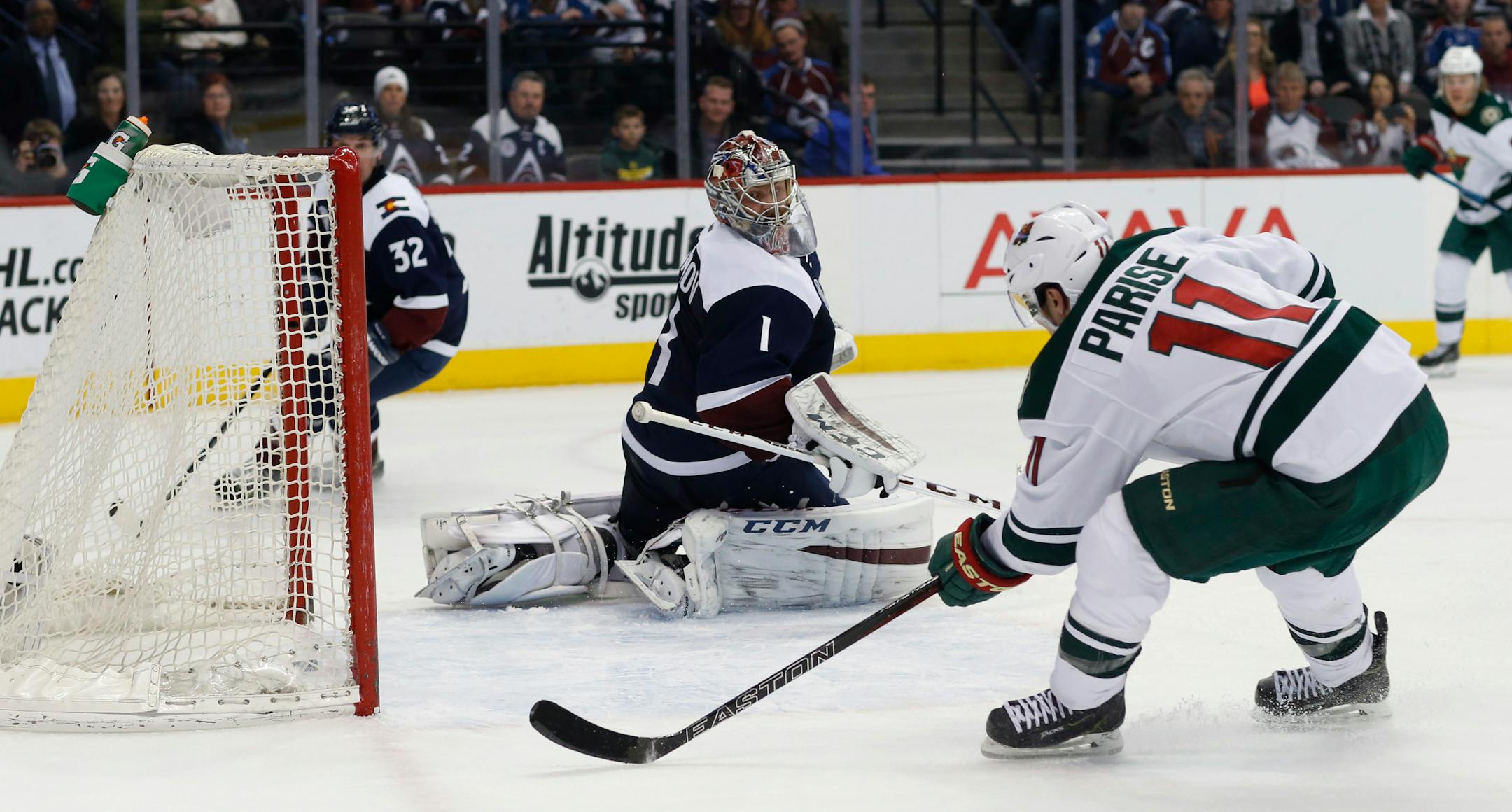 Wild left winger Zach Parise (11) scored past Avalanche goalie Semyon Varlamov in the second period Saturday in Denver.