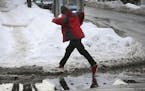 Winter's Artic grip loosened a bit Tuesday as temps in the metro hovered around the 40 degree mark, melting some snow and creating puddles in the proc