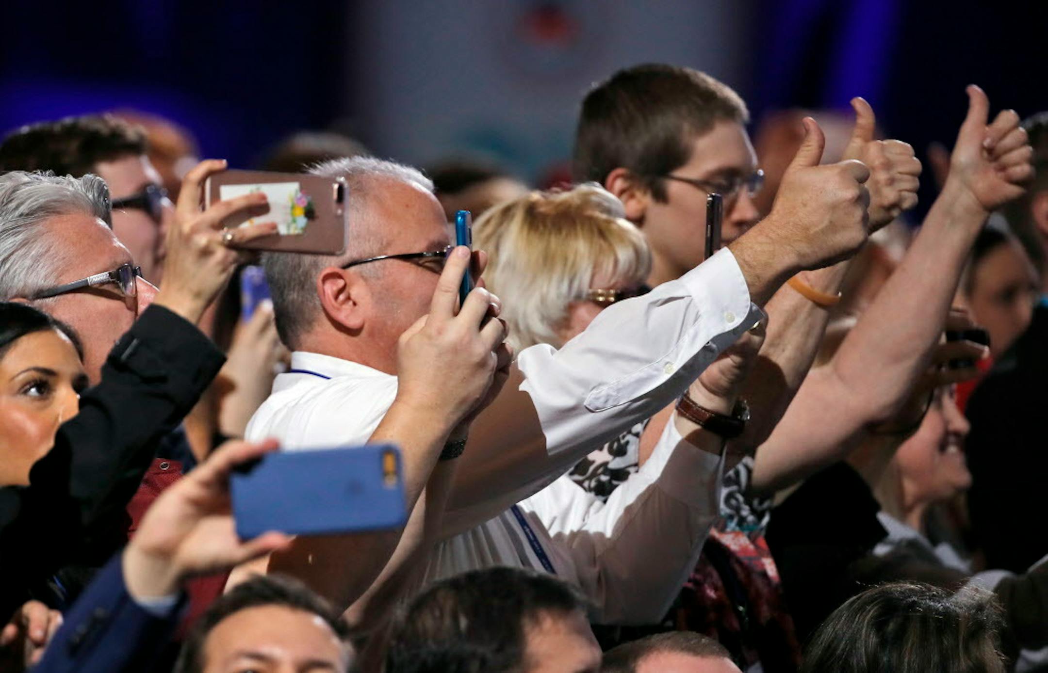 Supporters cheer and photograph President Donald Trump as he speaks at the Conservative Political Action Conference (CPAC), Friday, Feb. 24, 2017, in Oxon Hill, Md. (AP Photo/Alex Brandon)