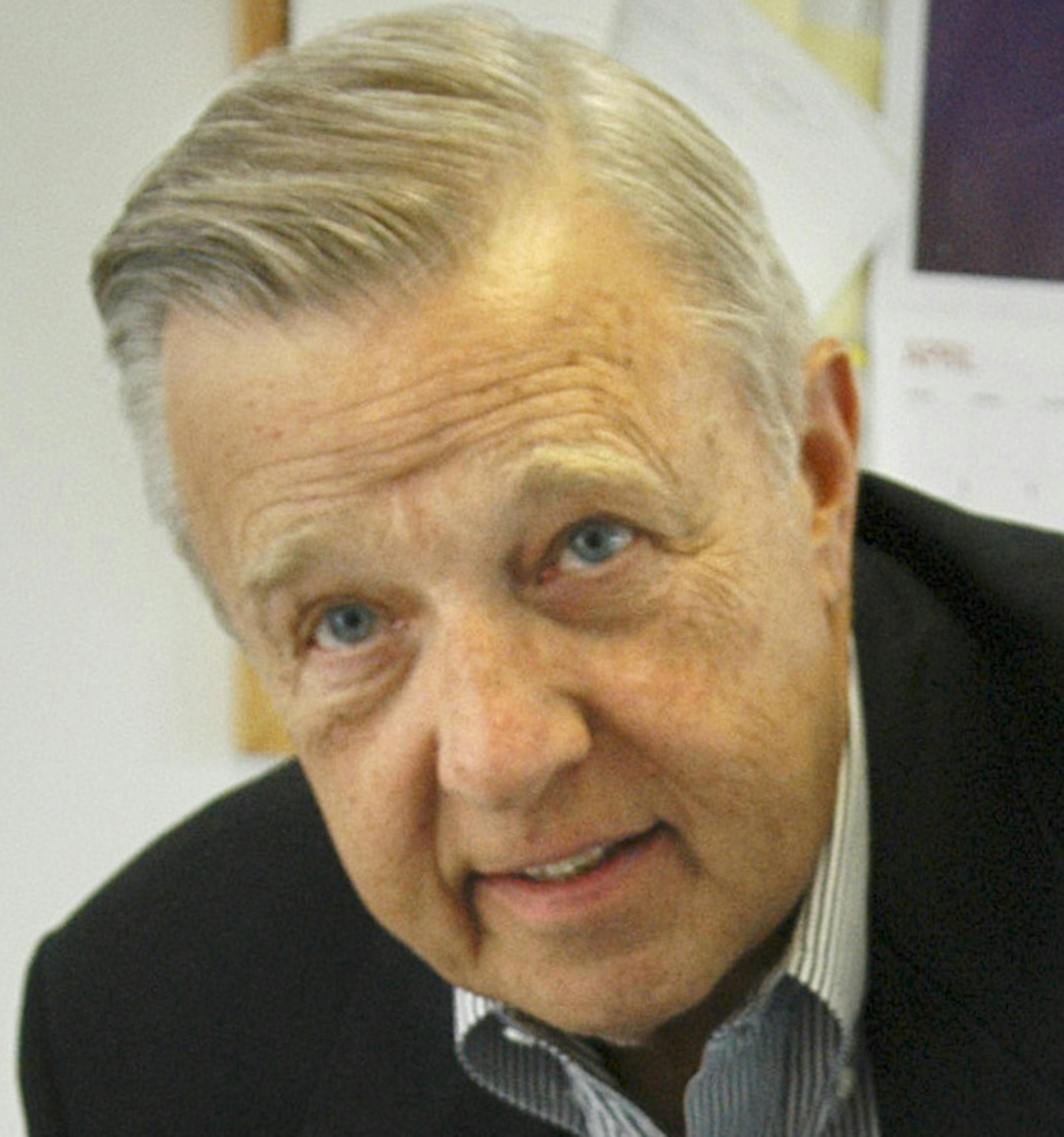 Glen Stubbe/Star Tribune Tuesday, May 17, 2005 -- Duluth, Minn. -- SUGGESTED SECONDARY PHOTO -- Saturn Systems CEO Jim Gustafson, left, and president and founder Keith Erickson, right, in their Duluth office. Saturn Systems Inc provides an alternatived to outsourcing for IT work done in the Duluth area.