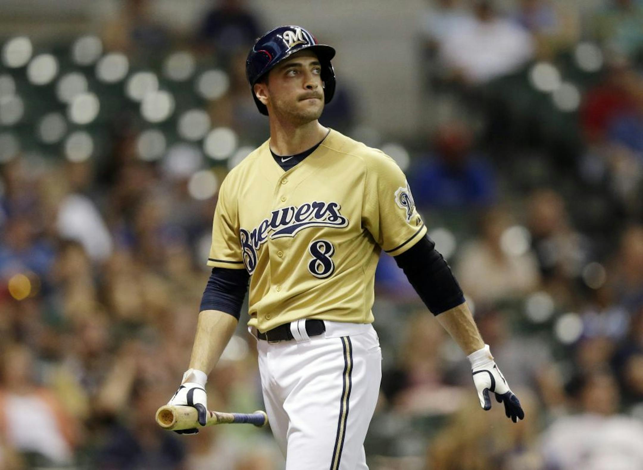 Ryan Braun reacts after striking out during the 11th inning of a game against the Miami Marlins Sunday, July 21, 2013, in Milwaukee. Braun, a former National League MVP, has been suspended without pay for the rest of the season for violating Major League Baseball's drug policies.