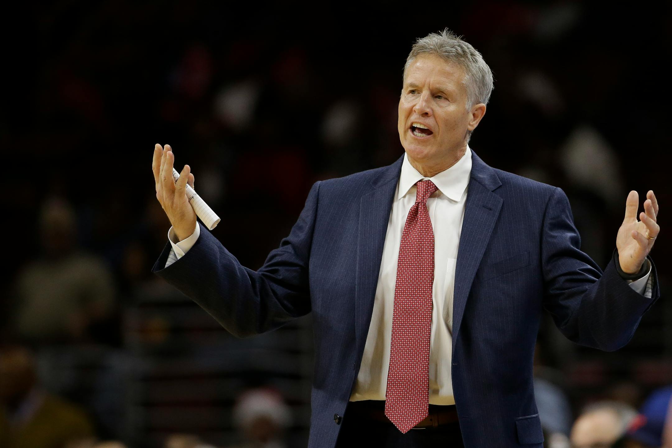 Philadelphia 76ers' Brett Brown in action during an NBA basketball game against the San Antonio Spurs, Monday, Dec. 1, 2014, in Philadelphia. (AP Photo/Matt Slocum)