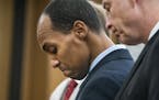 Former Minneapolis police Officer Mohamed Noor reads a statement in Minneapolis, before being sentenced by Judge Kathryn Quaintance in the fatal shoot