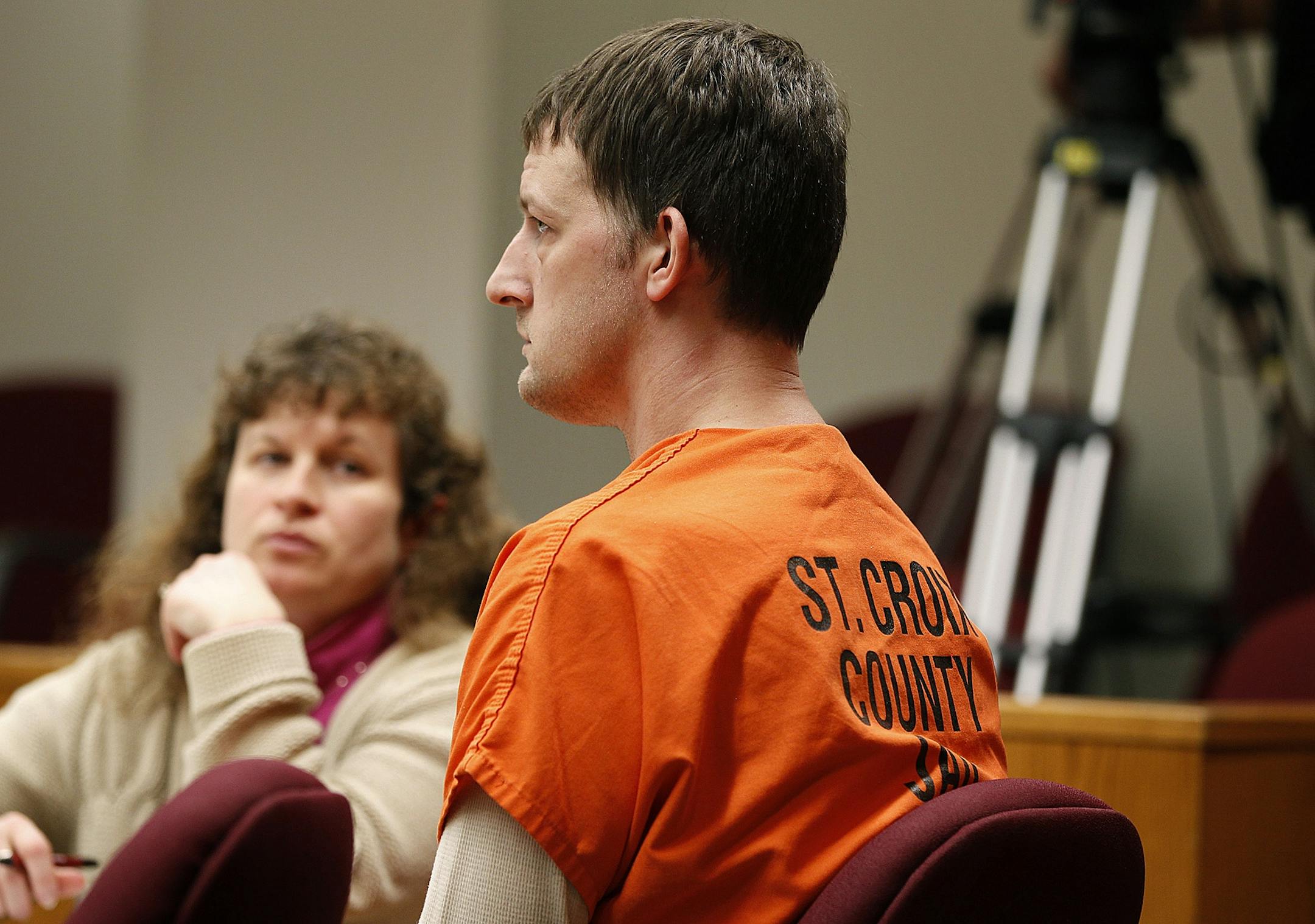 Attorney Donna Burger watched as Aaron Schaffhausen pleaded guilty, Thursday, March 28, 2013.