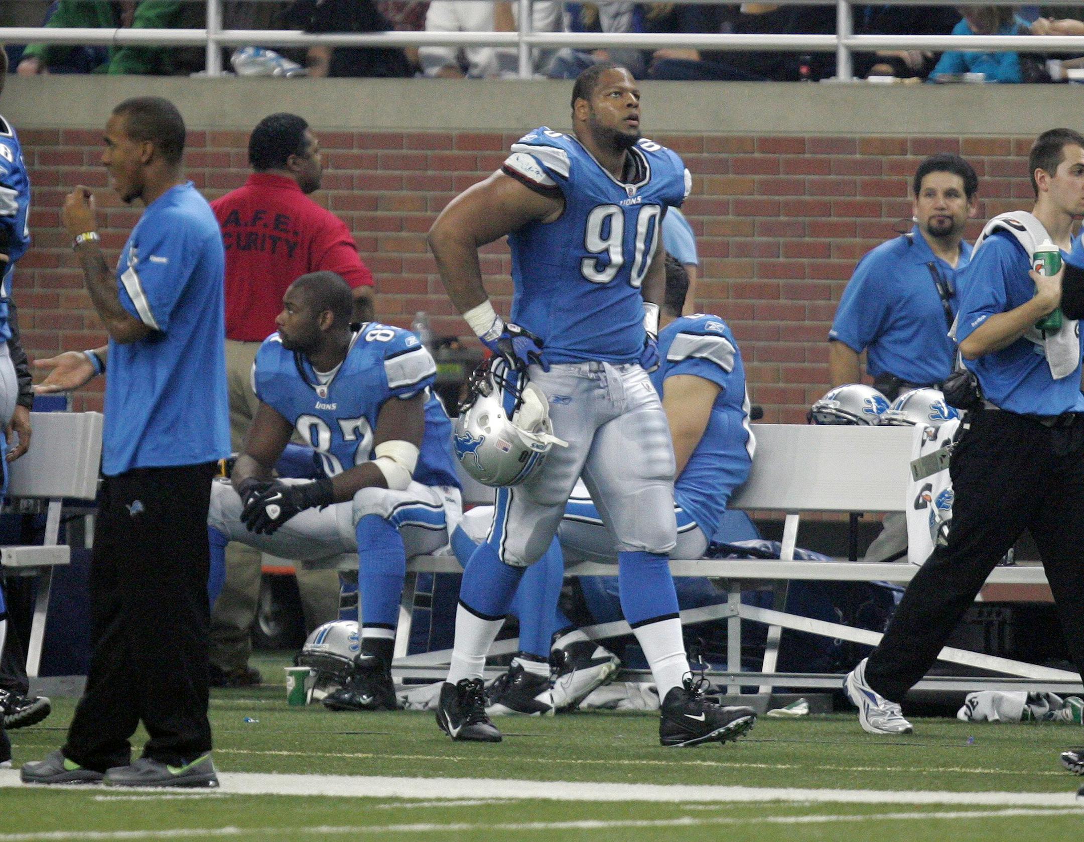 Detroit Lions defensive tackle Ndamukong Suh (90) walks on the sidelines after being ejected from the game against the Green Bay Packers during the third quarter at Ford Field in Detroit, Michigan, Thursday, November 24, 2011. The Packers defeated the Lions, 27-15. (Kirthmon F. Dozier/Detroit Free Press/MCT)