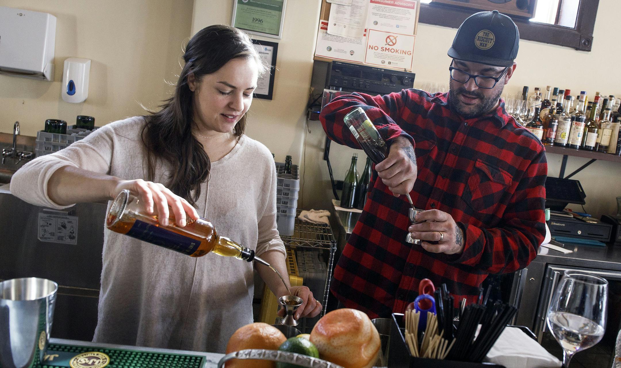 Married couple Valerie Szafranskion and Mike Simmons, owners of Cafe Marie-Jeanne in Chicago's Humboldt Park neighborhood, make house daiquiris inside the restaurant on Monday, Feb. 12, 2018. (Lou Foglia/Chicago Tribune/TNS)