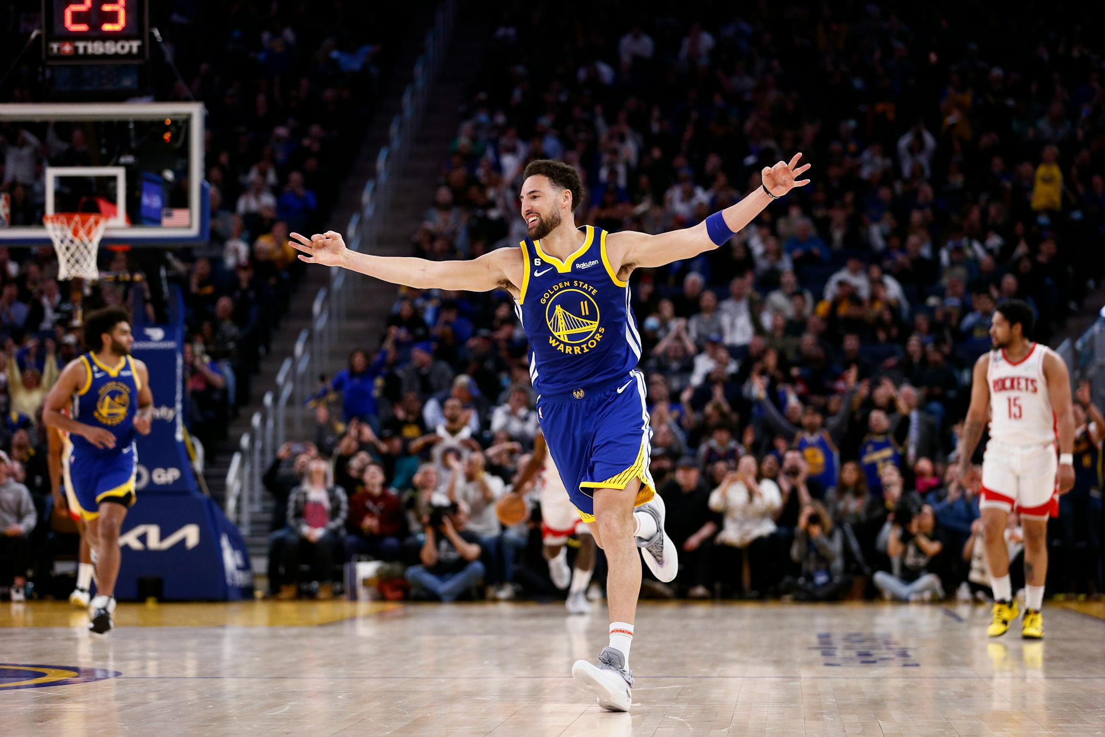 Golden State Warriors guard Klay Thompson celebrates after hitting a 3-pointer against the Houston Rockets during the fourth quarter of an NBA basketball game Friday, Feb. 24, 2023, in San Francisco. (Santiago Mejia/San Francisco Chronicle via AP)