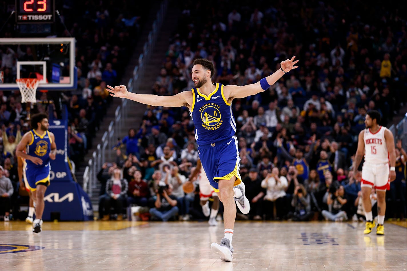 Golden State Warriors guard Klay Thompson celebrates after hitting a 3-pointer against the Houston Rockets during the fourth quarter of an NBA basketball game Friday, Feb. 24, 2023, in San Francisco. (Santiago Mejia/San Francisco Chronicle via AP)