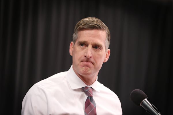 In this file photo from Jan. 5, 2018, Minnesota athletic director Mark Coyle speaks during a news conference at Williams Arena in Minneapolis. The Uni