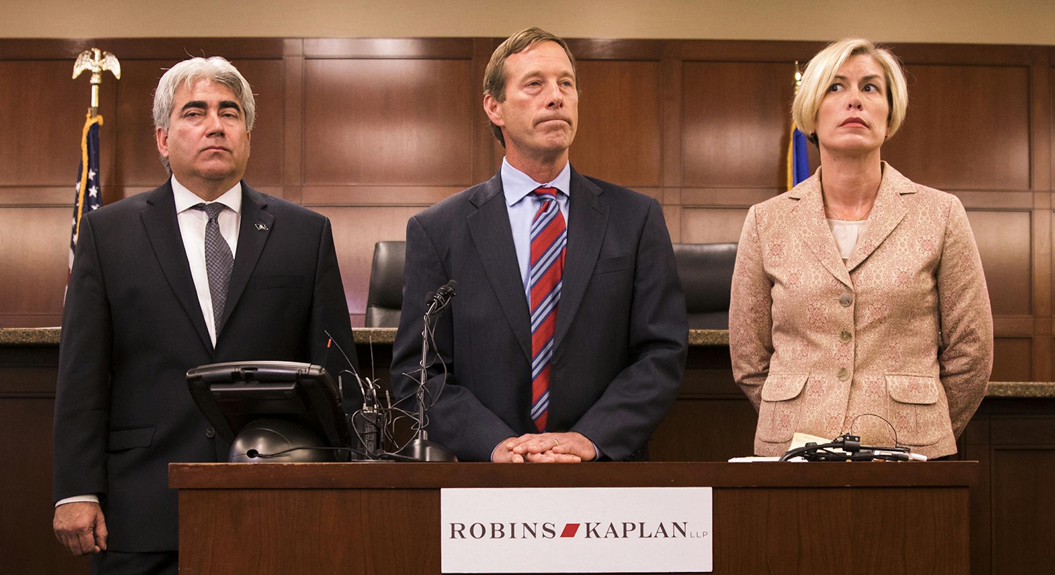 Attorneys Artie Martinez, from left, Chris Messerly, and Elizabeth Fors speak during a press conference. A photo of Baby JosÈ shortly after he was stillborn is displayed at right, and after he was found in the laundry facility at left. ] LEILA NAVIDI ï leila.navidi@startribune.com BACKGROUND INFORMATION: Press conference at Robins Kaplan LLP in downtown Minneapolis on Wednesday, October 11, 2017. A family is suing Regions Hospital after its staff threw their stillborn baby out with dir