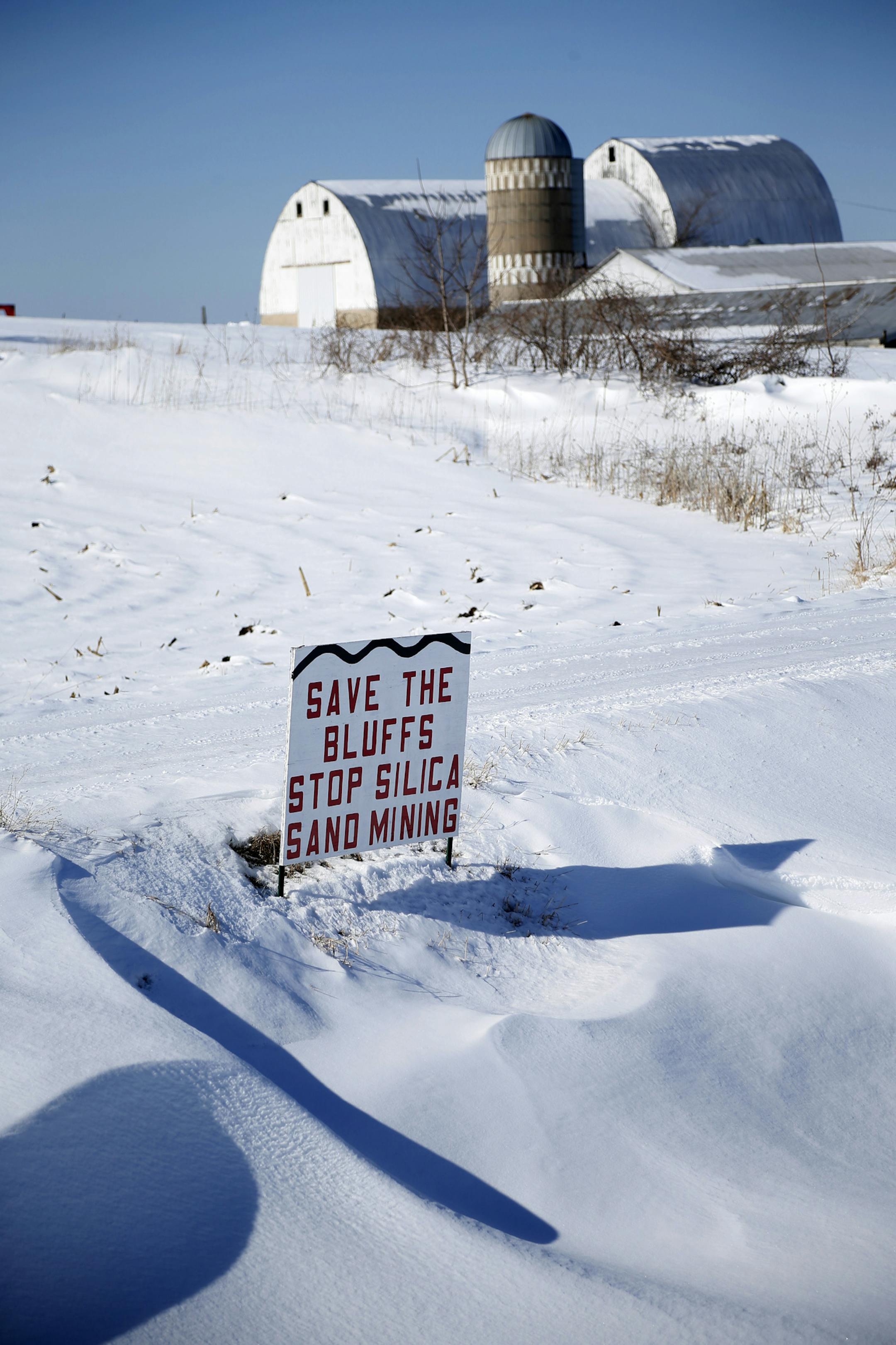 Signs of concern dot the landscape in Hay Creek Township south of Red Wing.
