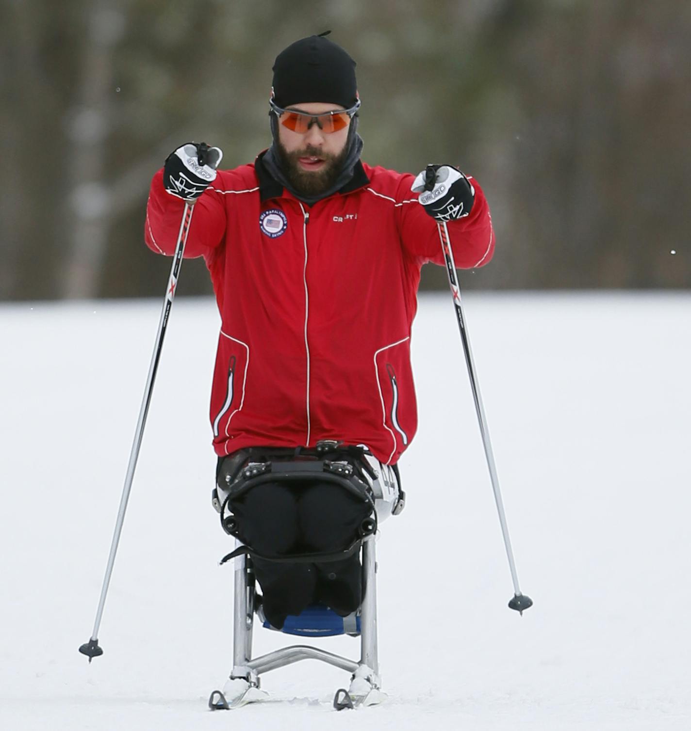 Park Rapids native Aaron Pike has been one of the top wheelchair marathoners in the U.S. for the past few years, and is now a member for the US. He now a member of the Paralympics cross country skiing team that practice Wednesday at Hyland Hills January 21, 2015 Bloomington, MN.] Jerry Holt/ Jerry.Holt@Startribune.com