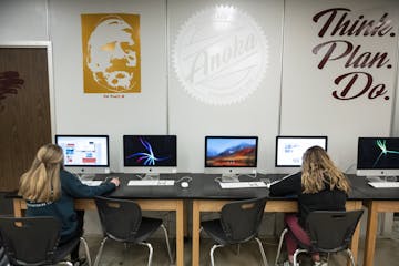 Students in yearbook class worked on their pages Tuesday afternoon at Anoka High School.