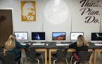 Students in yearbook class worked on their pages Tuesday afternoon at Anoka High School.