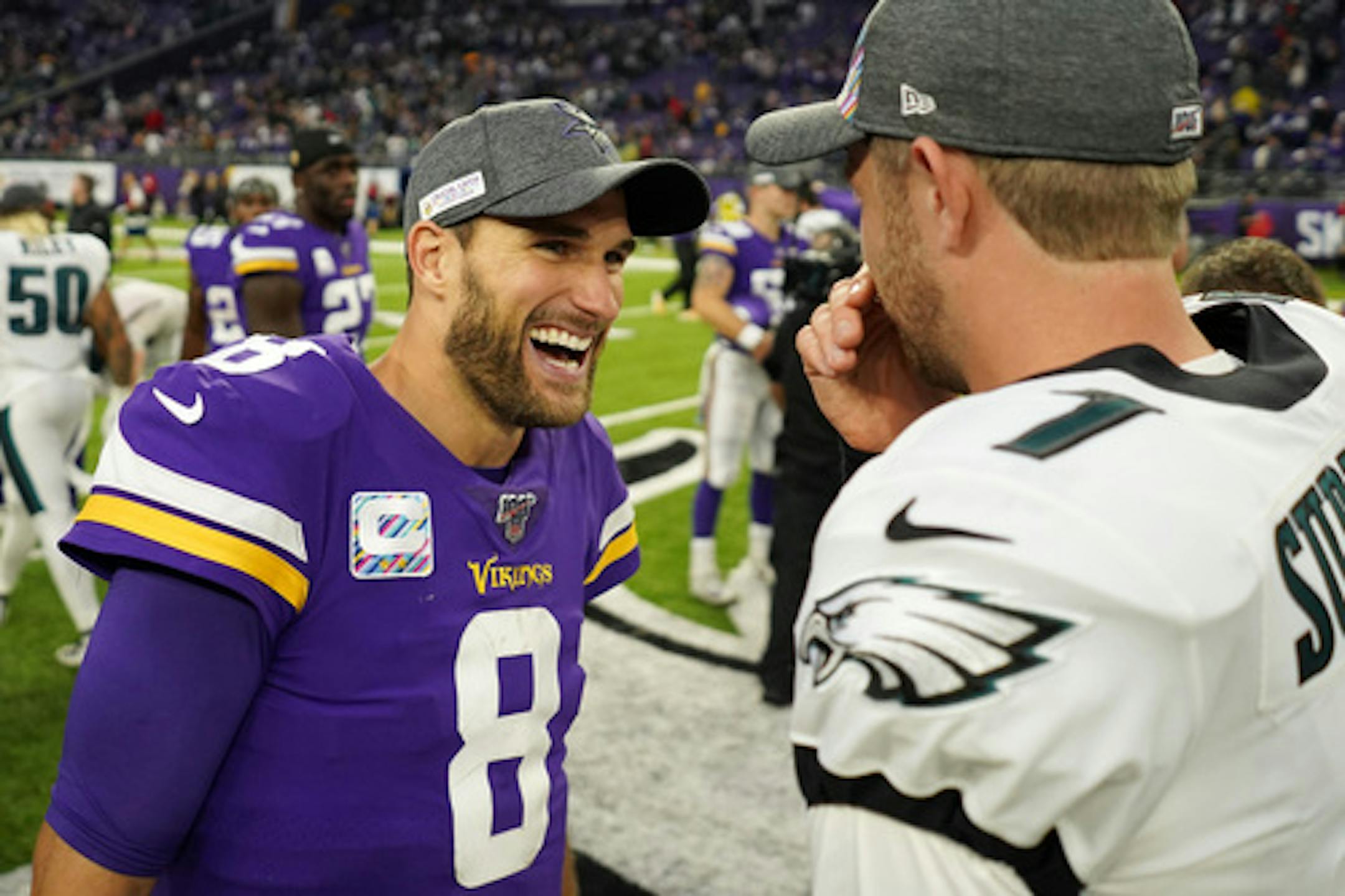 Minnesota Vikings quarterback Kirk Cousins (8) talked with Philadelphia Eagles quarterback Nate Sudfeld (7) at the end of Sunday's game. ] ANTHONY SOUFFLE • anthony.souffle@startribune.com