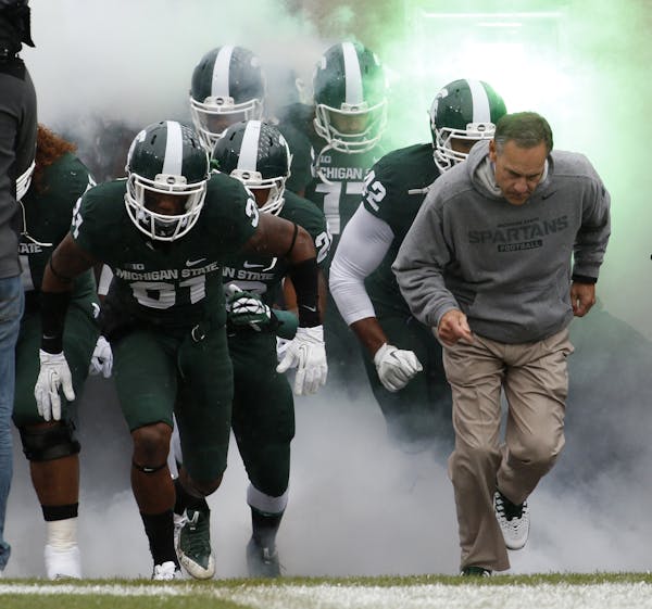 Coach Mark Dantonio and his Michigan State Spartans are chasing another Big Ten title.