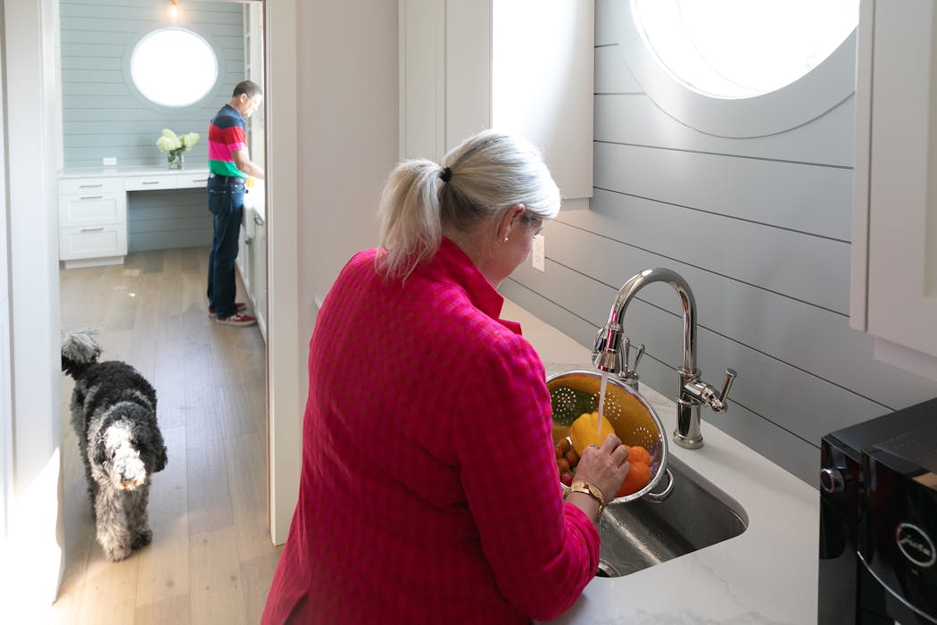 Holly VonDemfange rinsed vegetables in her second kitchen, which is connected to the main, open-concept kitchen in her home near Boise, Idaho.