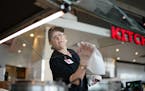 Kim Radman sanitized the salad and soup bars at Cub Foods in Minneapolis on March 11.