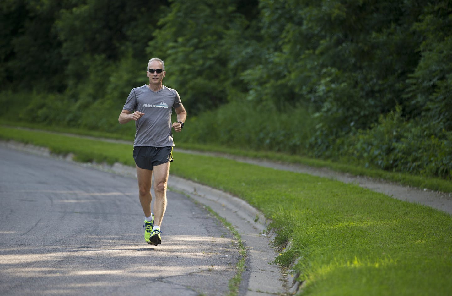 John Naslund is one of three people to have run all 36 Grandma's Marathons. He plans to run the 37th this year on June 22. He was photographed running near his home in Bloomington, Minn., on Tuesday, June 18, 2013. ] (RENEE JONES SCHNEIDER * reneejones@startribune.com)