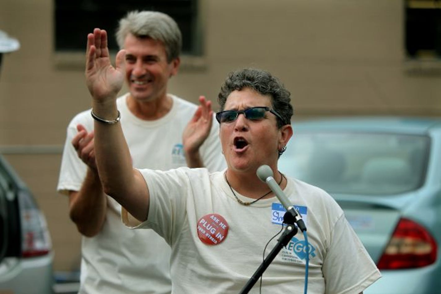 Shayna Berkowitz spoke happily about her business, ReGo Electric, as Mayor R.T. Rybak stood in support before leaving in his ReGo-converted Prius hybrid. Rybak and other DFLers said ReGo got no special favors because of Berkowitz's political contributions