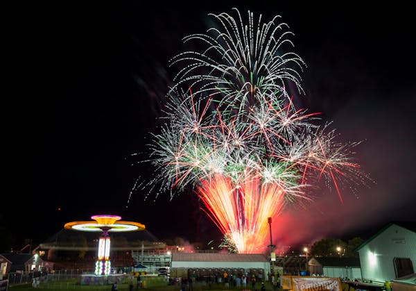 Fireworks exploded over the Carver County Fairgrounds as part of the Taste of Minnesota celebration in Waconia on July 2, 2015.