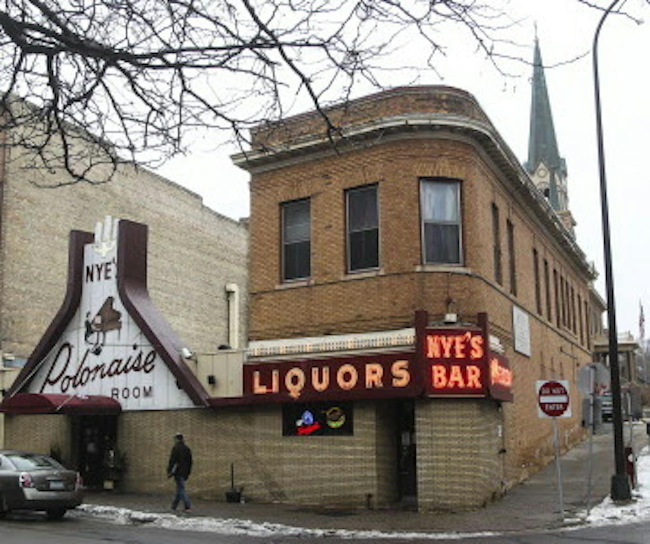 A three-story building to the left of the iconic Nye's Polonaise front door was built as a harness shop in 1907 was seen Friday, DEc. 5, 2014, in Minneapolis, MN.](DAVID JOLES/STARTRIBUNE)djoles@startribune.com The owner of Nye's Polonaise may intend to close the Minneapolis institution next year, but demolishing the buildings wil be a tough sell at City Hall. Two of the four buildings on the site are contributing to the St. Anthony Falls Historic District, which gives them major protections und