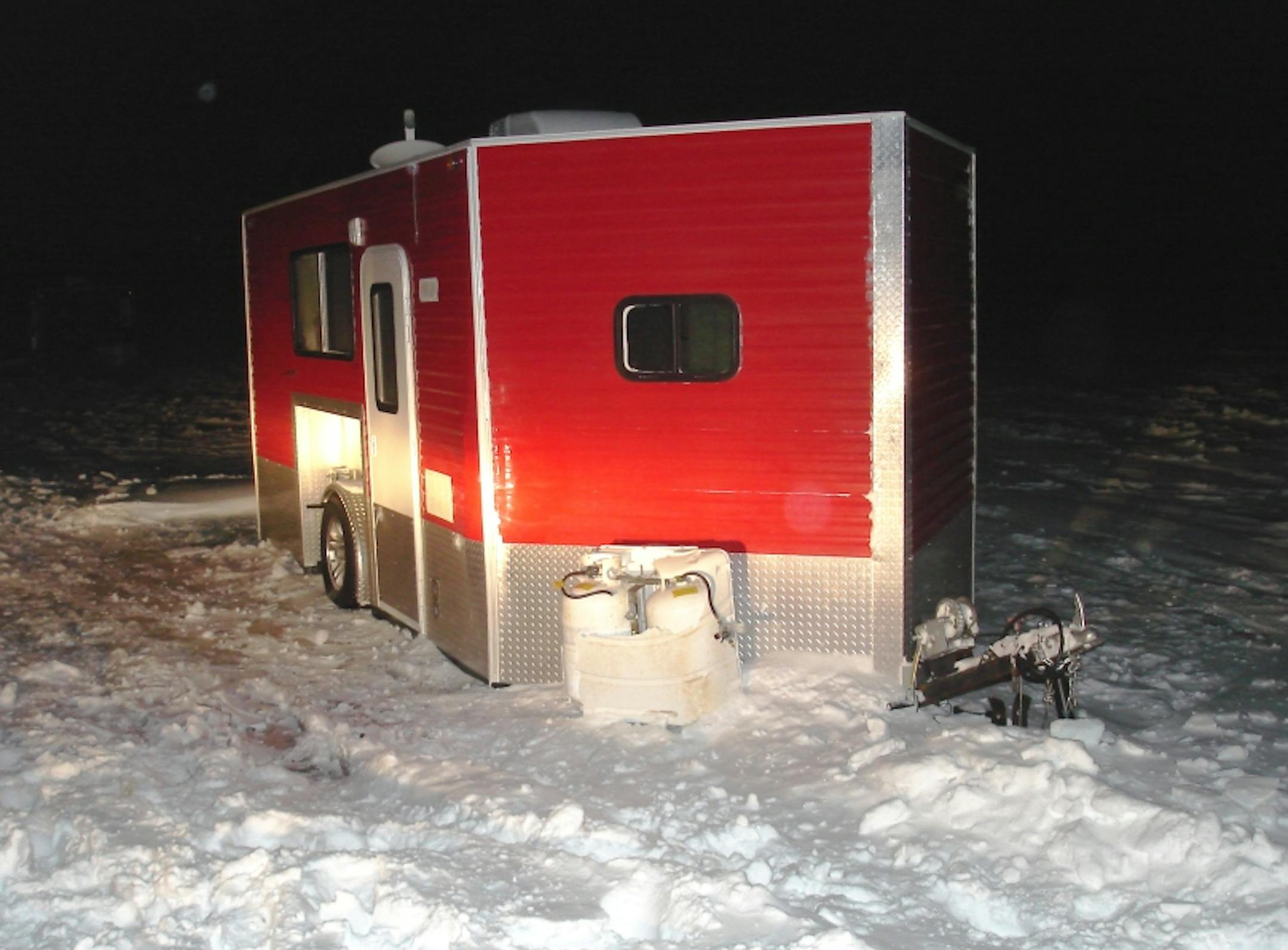 The ice fishing trailer on Bone Lake in western Wisconsin that a snowmobile could not avoid Wednesday night. Passenger Tori Henderson struck the trailer and was killed.