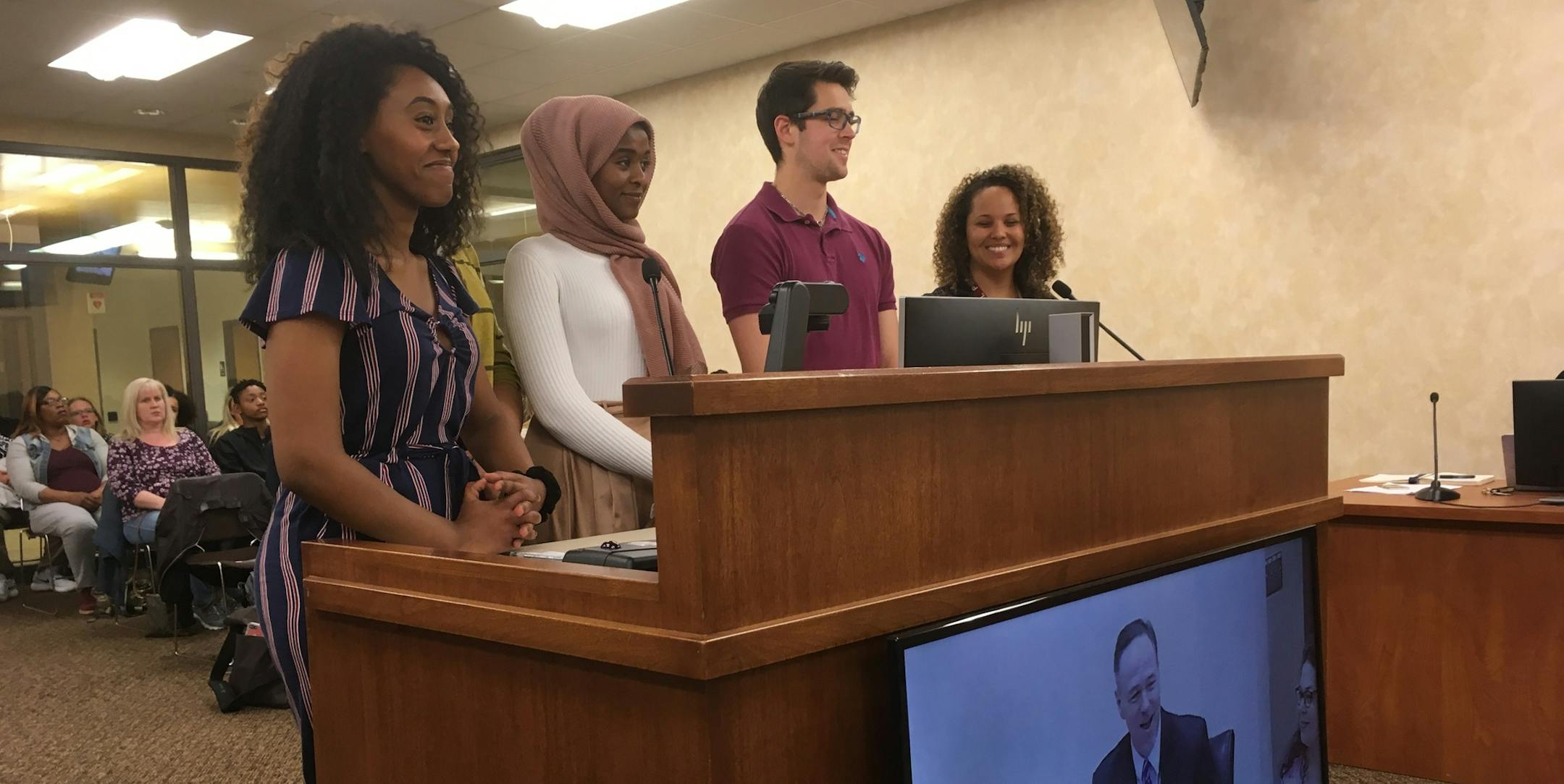 SSP students Naomi Gedey, Hafsa Ahmad, Emiliano Granados and teacher Jessica Davis spoke before the board Monday night, seeking to wear sashes at graduation to reflect their heritage.