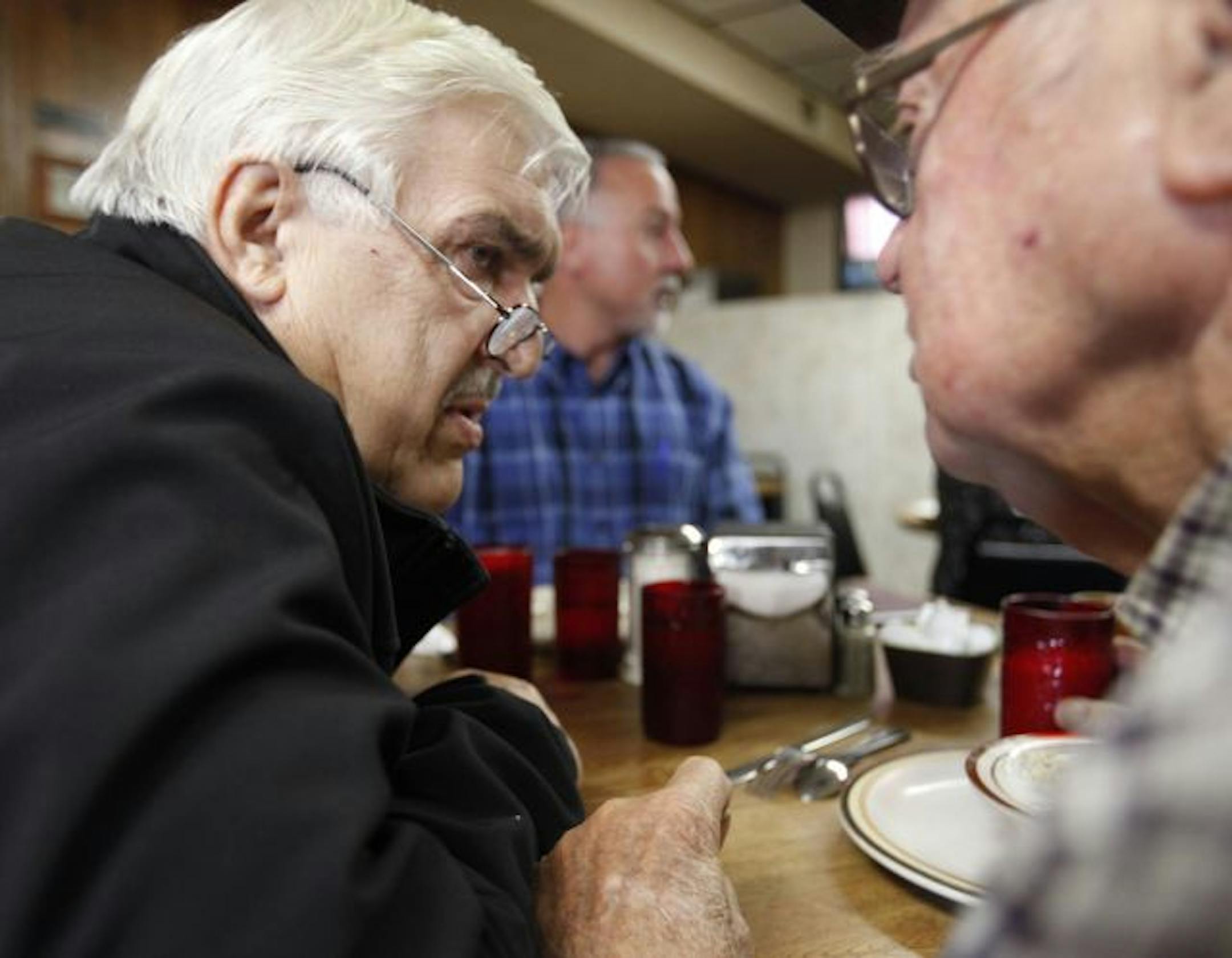 At the Red Ox diner, Anoka County Commissiner Dick Lang holds informal court with Walter Osborne who is having oatmeal for breakfast. Osborne, 83, also leases office space to Lang and would like to see his property taxes remain low.