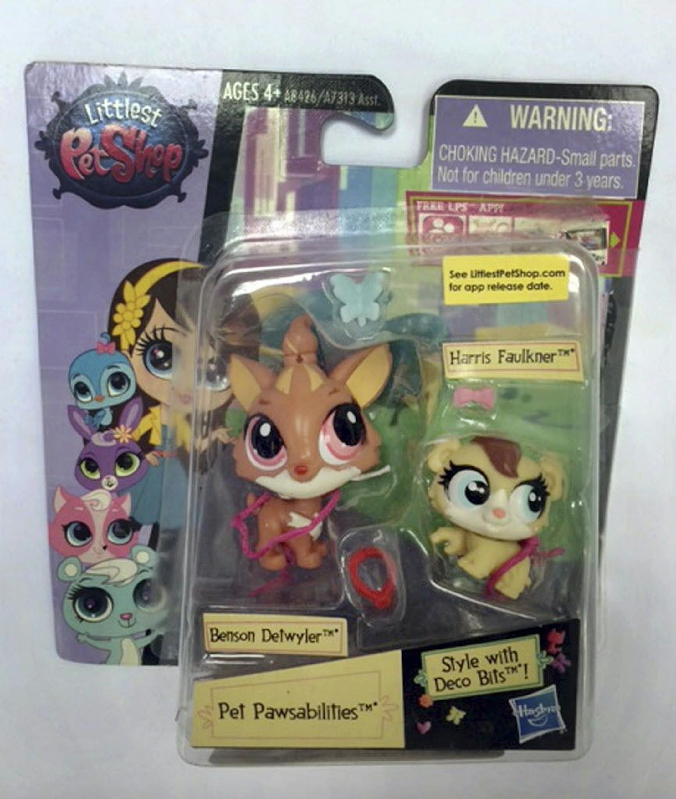 This June 23, 2015 photo released by the Hogan Lovells law firm shows toys from Hasbro's "Littlest Pet Shop" line in New York, including characters named Benson Detwyler and Harris Faulkner.