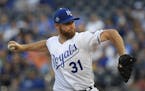 Kansas City Royals starting pitcher Ian Kennedy throws during the first inning of a baseball game against the Minnesota Twins in Kansas City, Mo., Sat