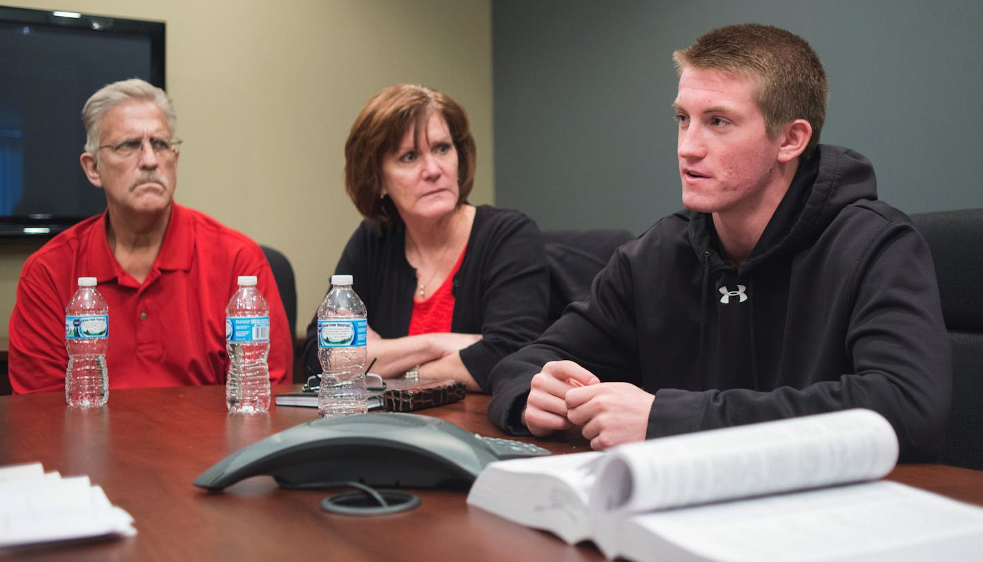 Curt Sagehorn and his wife Lori listen to their son Reid speak about his suspension at attorney Joe Friedberg's office. Reid Sagehorn was suspended two months for a tweet school officials claim implicated an inappropriate relationship with a teacher.