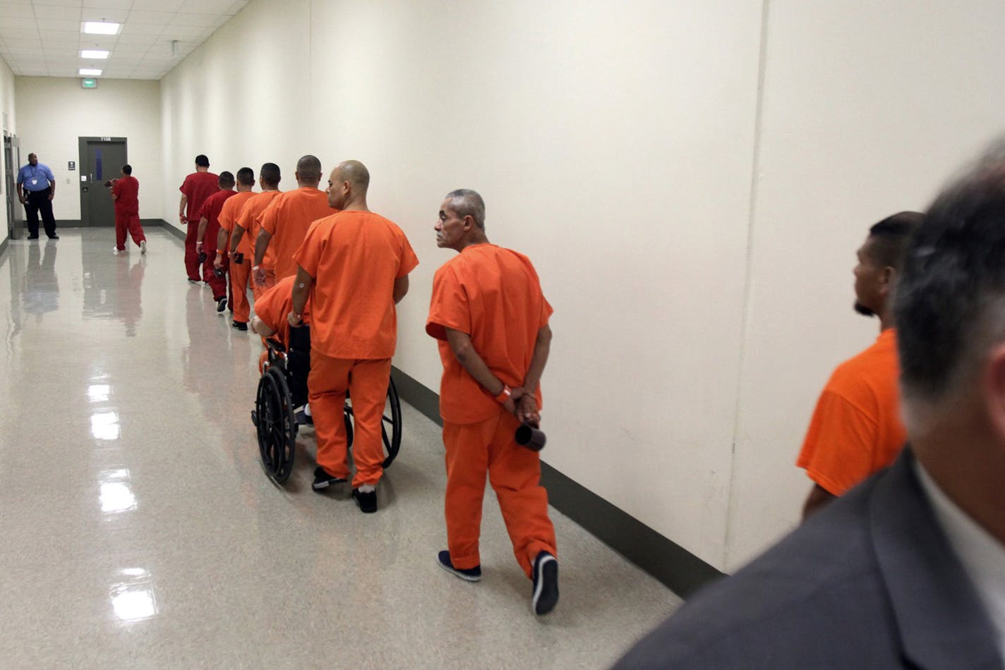 A lawsuit claims some previously deported detainees have been denied a speedy determination of their immigration status after they claimed a fear of persecution or torture if they are deported again. Above, detainees at the government's Adelanto, Calif., facility last fall. (Cheryl A. Guerrero/Los Angeles Times/TNS) ORG XMIT: 1644892