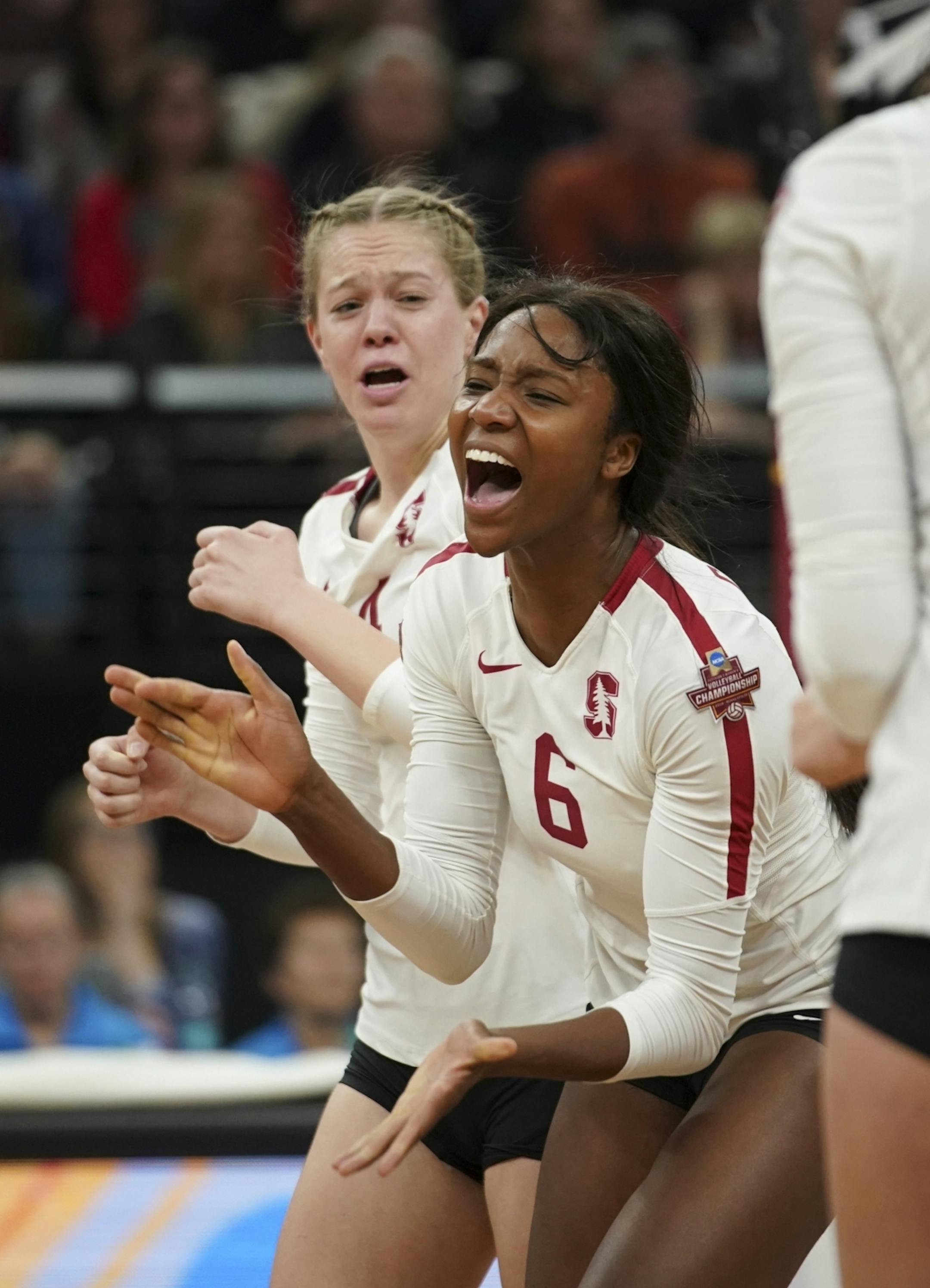 Stanford's Tami Alade (6) and Meghan McClure (4) celebrated a successful block they made late in the third set against BYU.