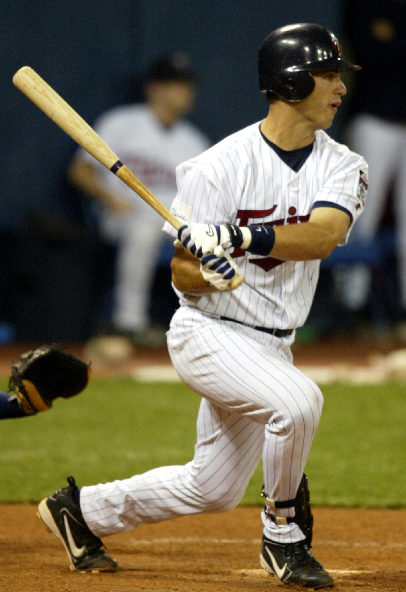 Carlos Gonzalez/Star Tribune April 5, 2004
Minneapolis, MN-The Metrodome- MLB- Minnesota Twins vs. Cleveland Indians &#xd2; Twins Home opener &#xd2; Minnesota rookie catcher Joe Mauer, get his first hit as a Minnesota Twin in the 9th inning of the Twins Home opener on Monday. baseball