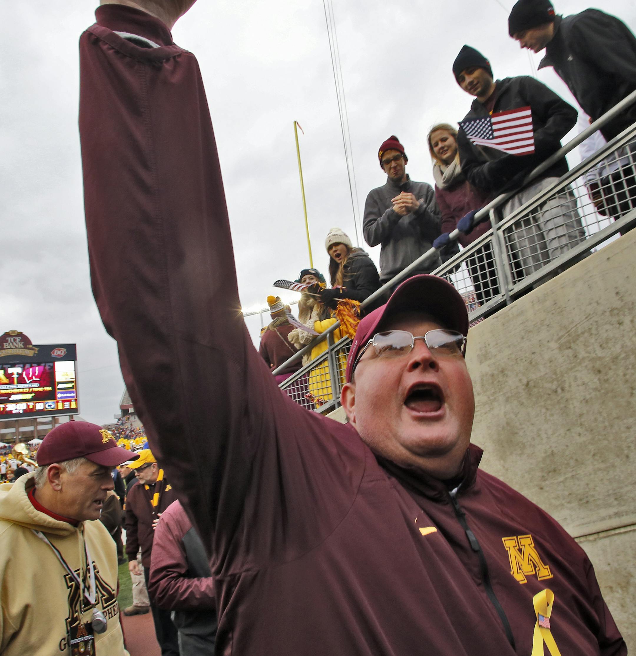 Minnesota Gophers vs. Penn State. Minnesota won 24-10. Minnesota coach Tracy Claeys acknowledged the cheers of the crowd at the end of the game. (MARLIN LEVISON/STARTRIBUNE(mlevison@startribune.com) ORG XMIT: MIN1311091509239817 ORG XMIT: MIN1403011619430090