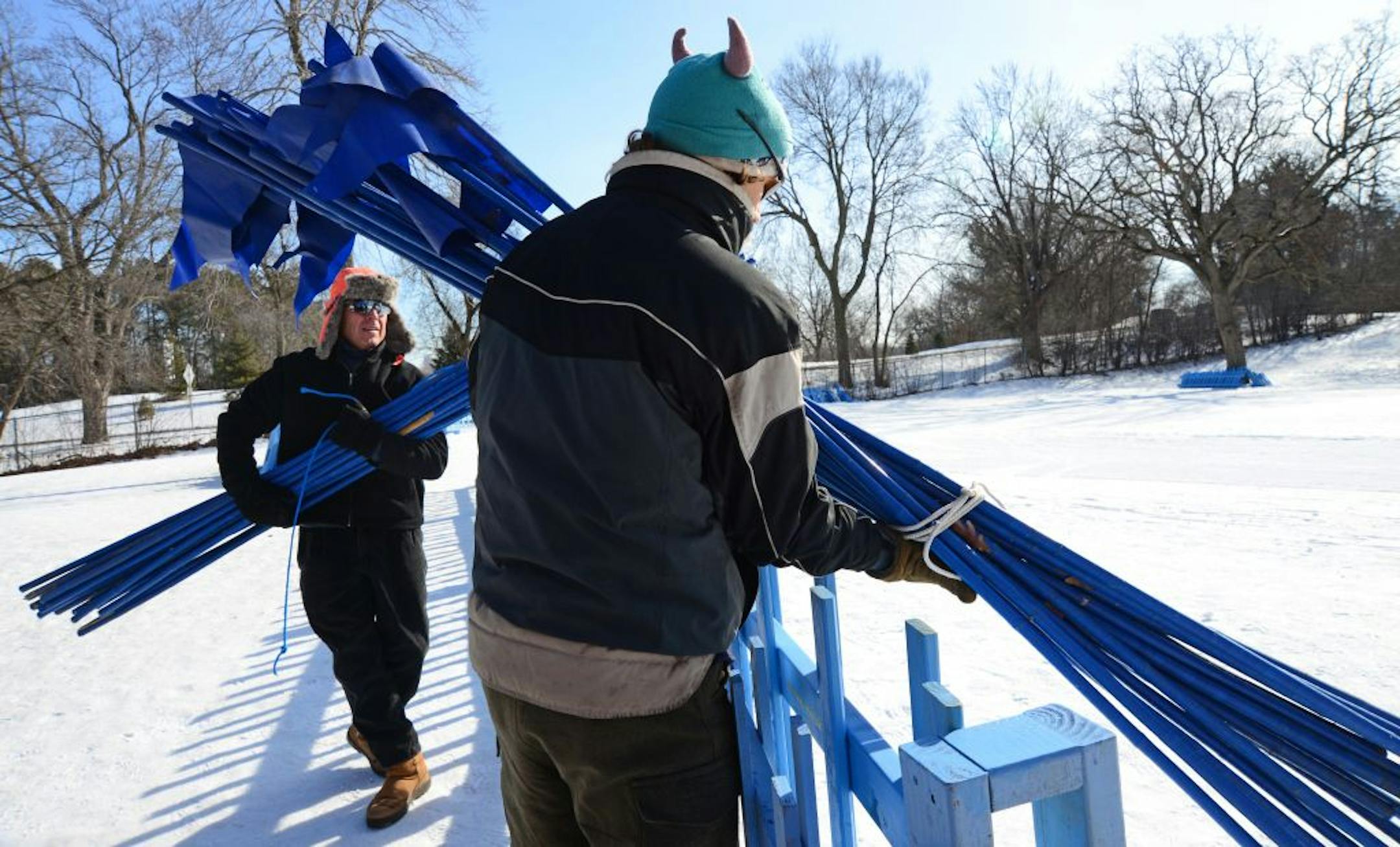 Crews were building fences late last week in preparation for the City of Lakes Loppet Ski Festival. The park is caught in a tug of war over changes to accommodate rising interest in cross-country skiing and off-road biking. Golfers fear the changes will harm their sport.