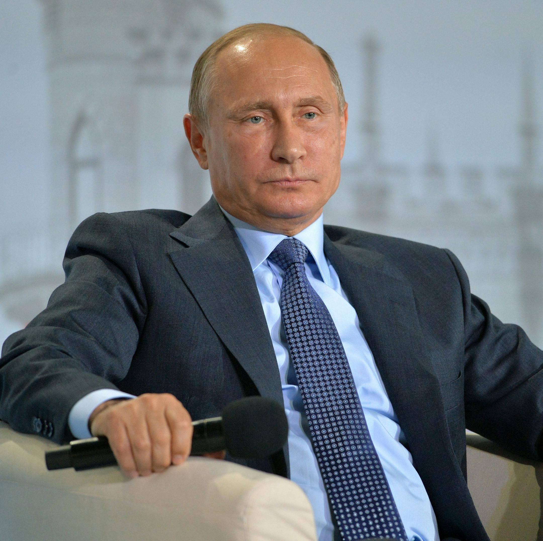 Russian President Vladimir Putin attends a meeting of the Russian People's Front movement in the Black Sea resort of Yalta, Crimea, Wednesday, Oct. 26, 2016. (Alexei Druzhinin/Sputnik, Kremlin Pool Photo via AP)