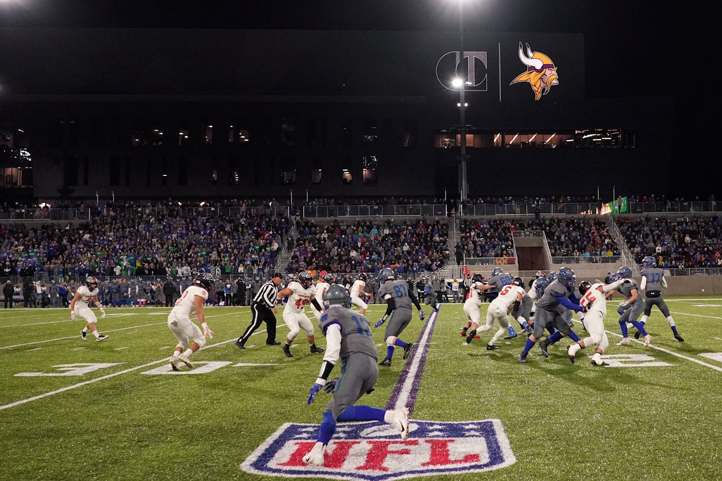 Eagan and Farmington played under the lights in the first high school football game at TCO Stadium in 2018.