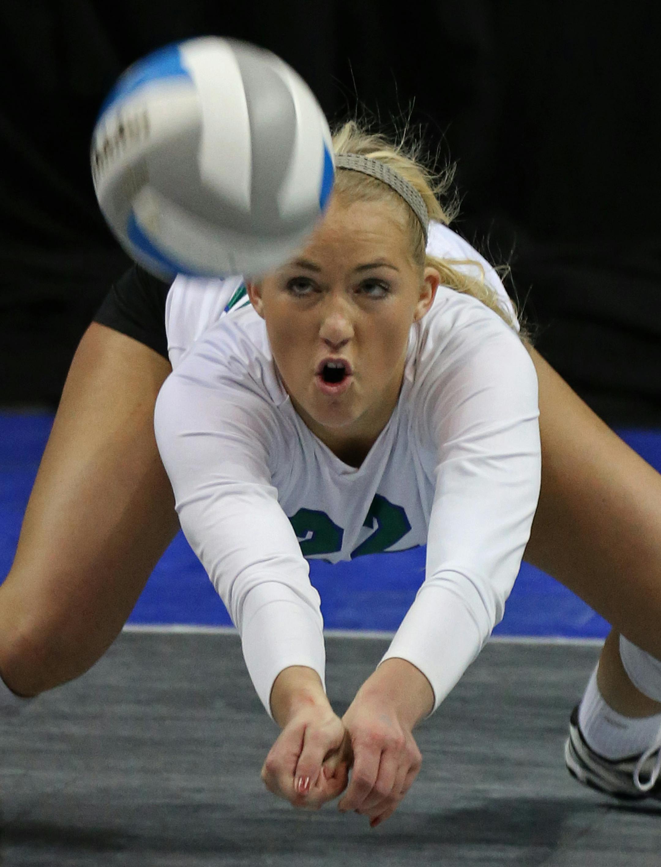 corrects last name to Madison - Minnesota State High School League Girls Volleyball State Tournament, 11/8/13, Xcel Energy Center. Class 3A state volleyball semifinals, Eagan vs Eden Prairie. (left to right) Eagan's Kelly Madison dug out an Eden Prairie serve.] Bruce Bisping/Star Tribune bbisping@startribune.com Kelly Madison/roster.