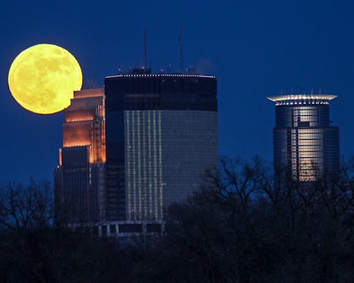 Supermoon rising over Minneapolis.