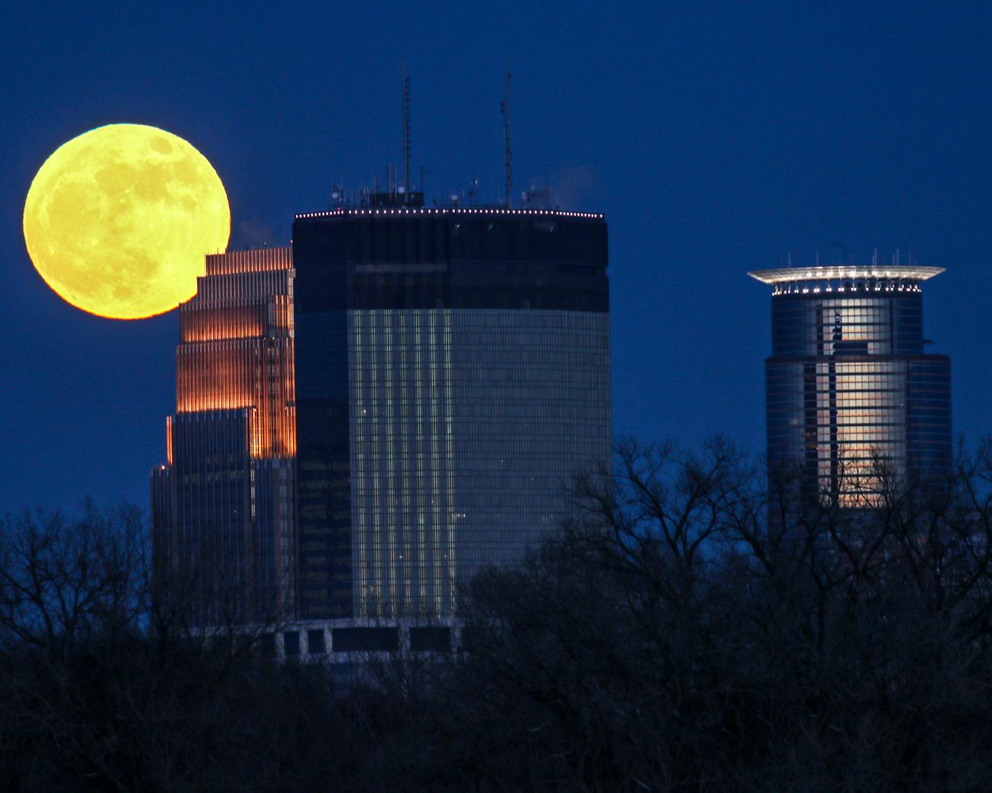 Supermoon rising over Minneapolis.