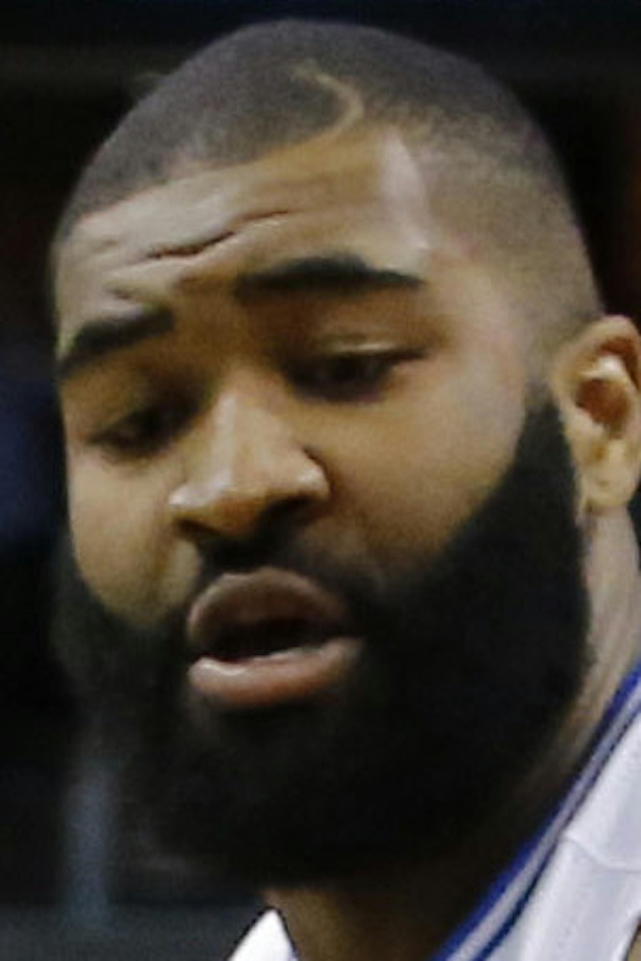 Phoenix Suns guard Eric Bledsoe drives past Orlando Magic forward Kyle O'Quinn, rear, during the second half of an NBA basketball game, Wednesday, March 19, 2014, in Phoenix. The Suns won 109-93. (AP Photo/Matt York)
