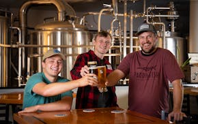 Co-owners, from left, Eric Johnson, Luke Dragseth and Dave Long opened Paddlefish Brewing last year in St. Peter, Minn., after the first two graduated